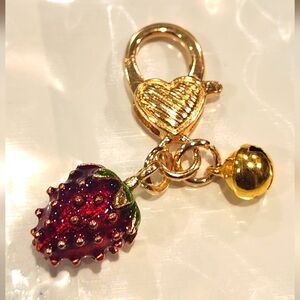 Strawberry Bag Charm with Gold Bell Accent.